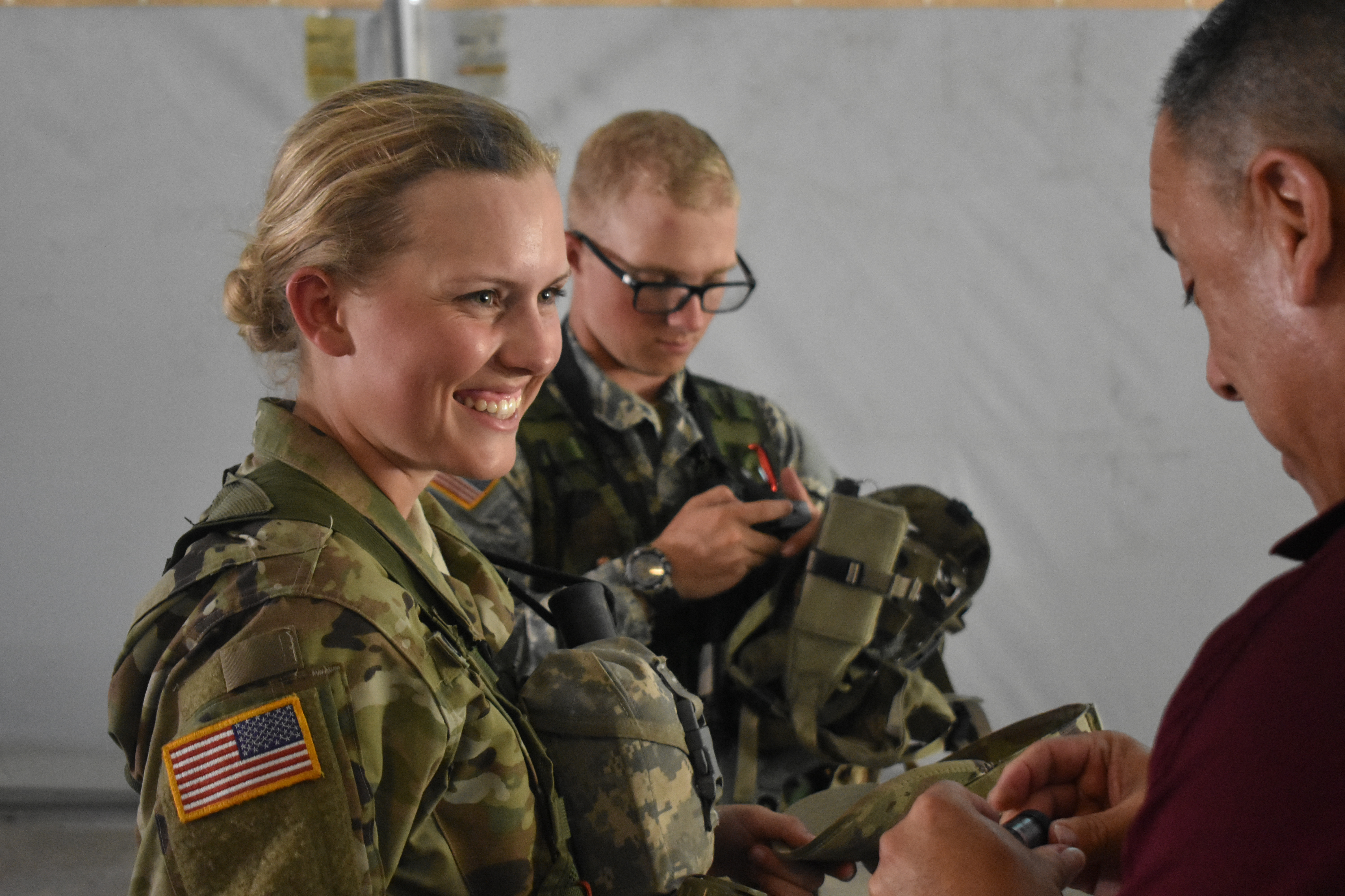 soldier smiling at an elder 
