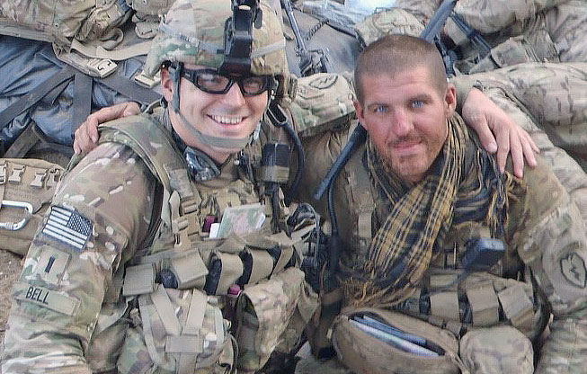 2 soldiers smiling together 